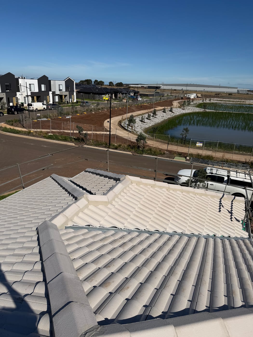 Charcoal tile roof finished beside a lake in Melbourne