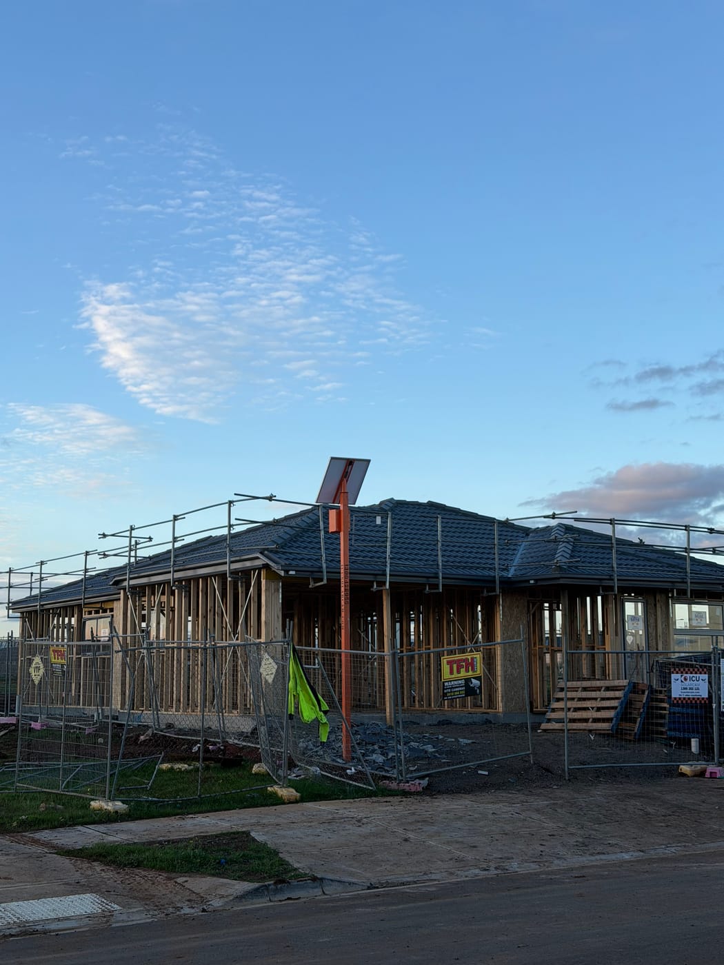Single-storey new build with a full charcoal tile roof