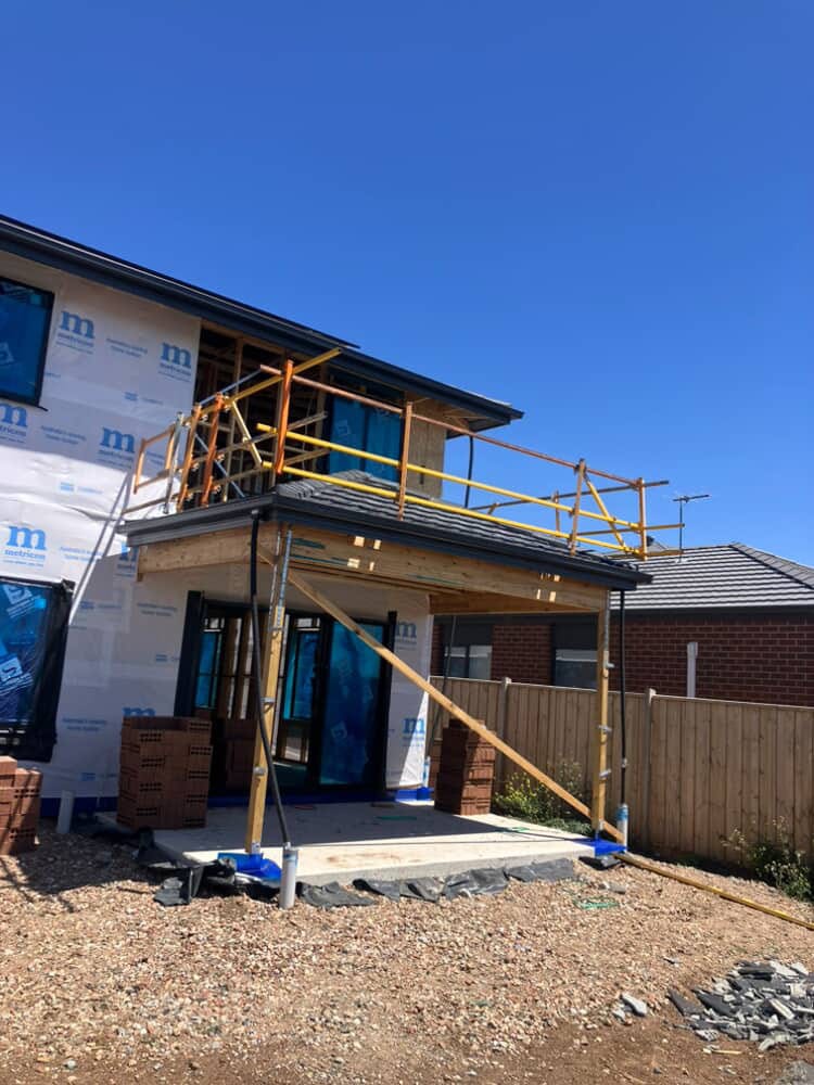 New charcoal concrete tile roof on a Melbourne new build