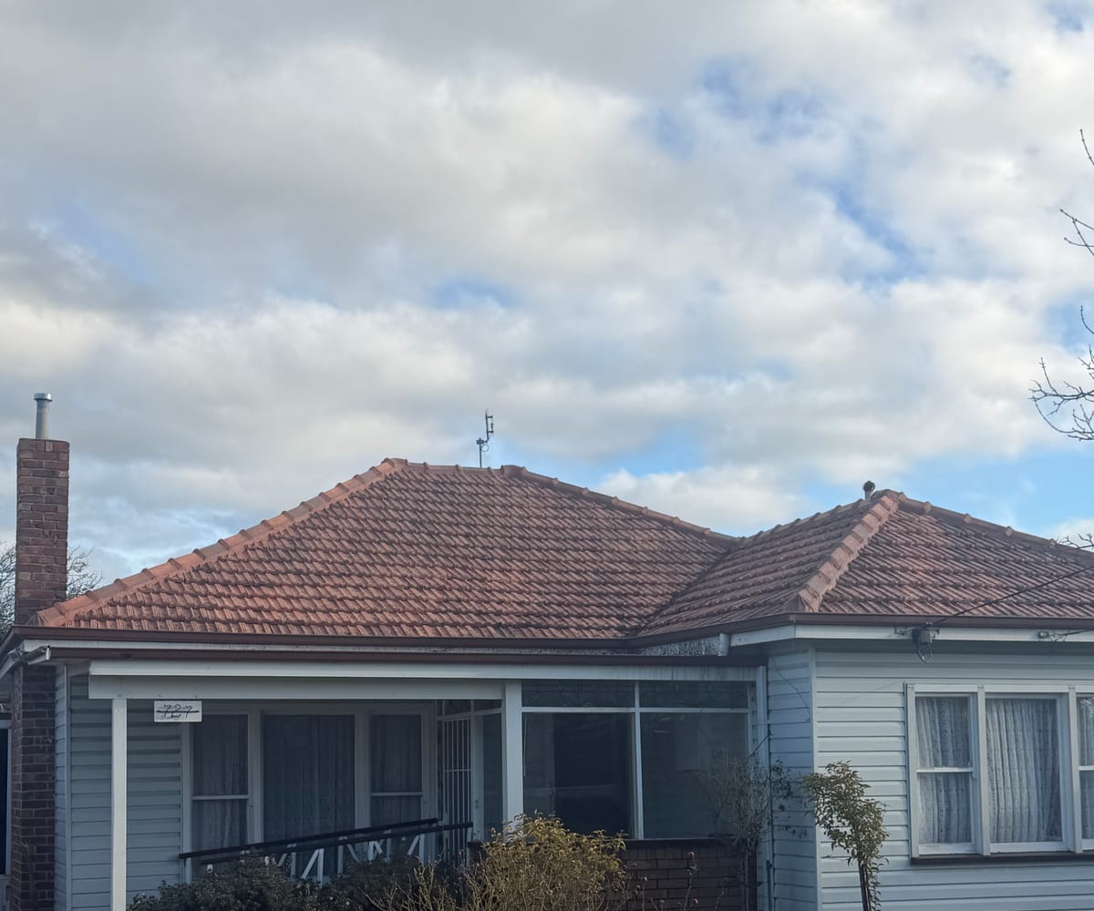 Restored tile roof, cleaned back to a fresh terracotta finish